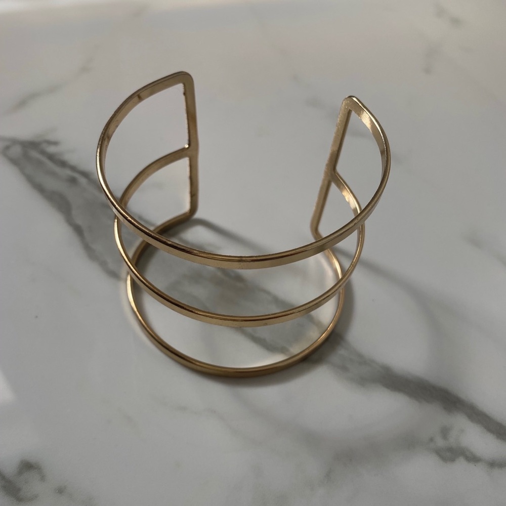 Gold tone cuff bracelet